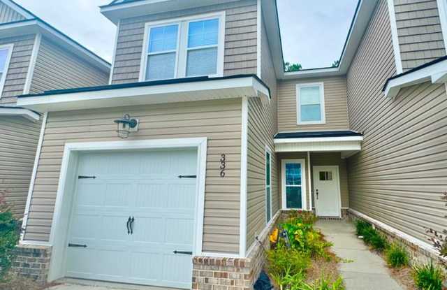 Welcome to this stunning 3-bedroom, 3-bathroom townhome located in the desirable Berkley Walk subdivision of Pooler, GA. photos photos