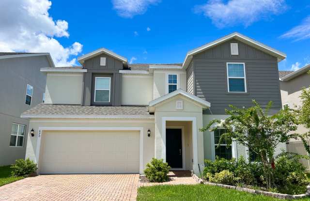 Stylish and Spacious 3/2.5 Home with No Rear Neighbors in Minneola photos photos