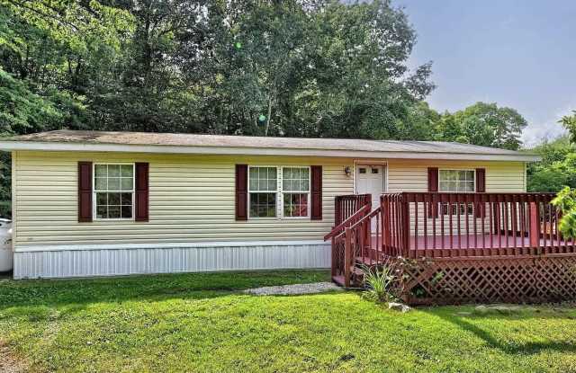 3 Bed, 2 Bath Home with Decks on a Private Lot in Modena Gallery 1
