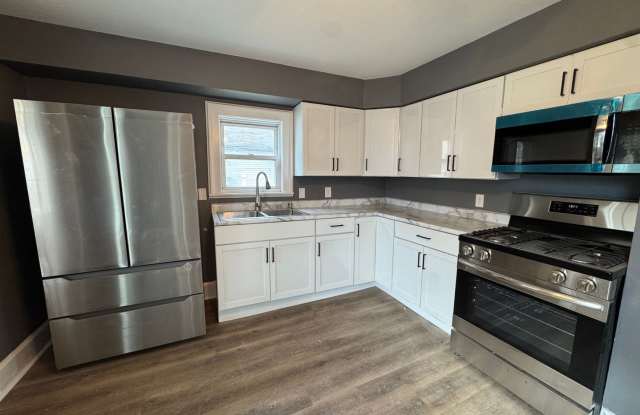 Spacious 4-Bedroom Home with Porch, Deck and Fenced Yard! Gallery 3