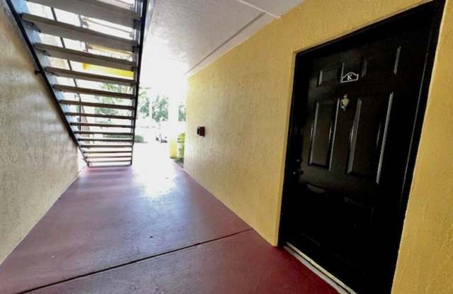 MOVE IN NOW!! Gated community Miriada! 1st floor 1X1.5 bath condo near pool area!!! Laminate wood flooring in living area and carpet in bedroom! Has washer & dryer! Gas stove & water heater! Gallery 4