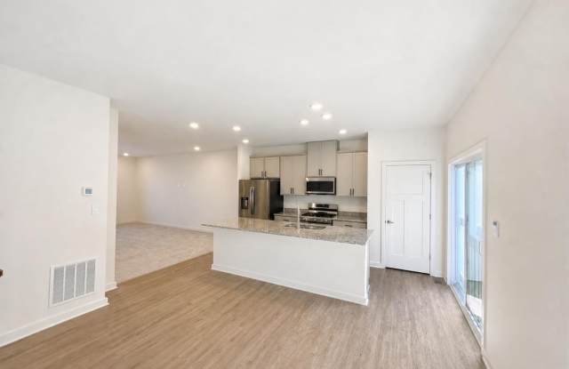 Brand-new townhome with modern finishes, flexible living space, and low-maintenance living. Gallery 4