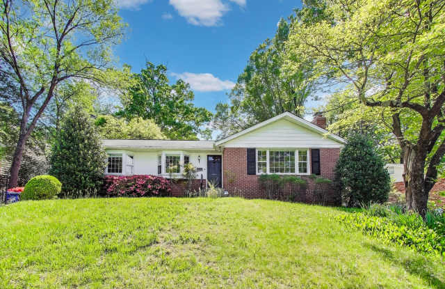 Charming brick home featuring a delightful four season sun room! photos photos