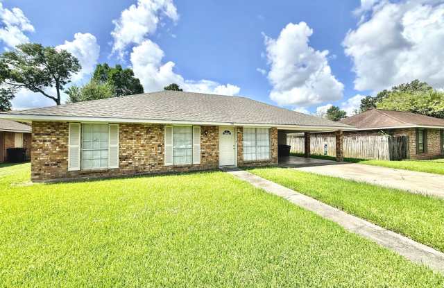 Bright & Spacious 3 Bedroom Brick Home with Double Carport & Large Backyard Gallery 1