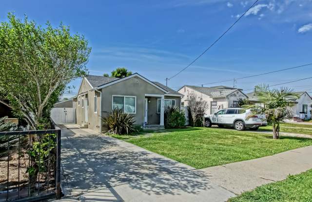REMODELED, CHARMING & AIRY 3BR2BA HOME W/ OFFICE ON A LARGE LOT W/ NICELY LANDSCAPED FRONT YARD, LARGE FENCED REAR YARD W/ DECK & LARGE 3-CAR DRIVEWAY NEXT TO SCHOOL, PARK, SHOPPING, FREEWAY ACCESS & 10 MINS TO BEACH! photos photos