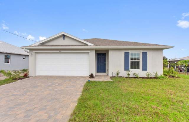 BRAND NEW HOME! Modern, energy efficient home with ALL of the upgrades! Lehigh Acres, FL photos photos