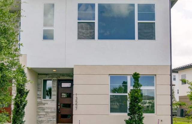 Elegant 3 Bed/2 Bath Townhome For Rent in the Eagle Creek Community of Lake Nona! photos photos