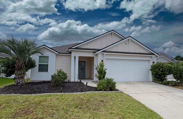 Spacious 4-bedroom, 2-bathroom home featuring an open-concept floor plan and a comfortable, modern layout Gallery 1
