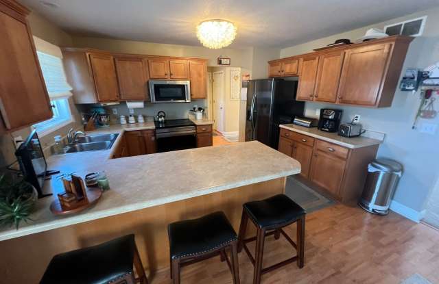 Great family home next door to Edwards Elementary in west Ames-4 bedroom 3 1/2 baths, 2 car garage, bonus sun room photos photos