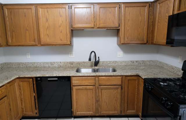 Must see in person! Well maintained 3 Bed 2.5 bath condo in a very quiet location. 2 car detached. Full unfinished basement w/shelving. Gallery 4