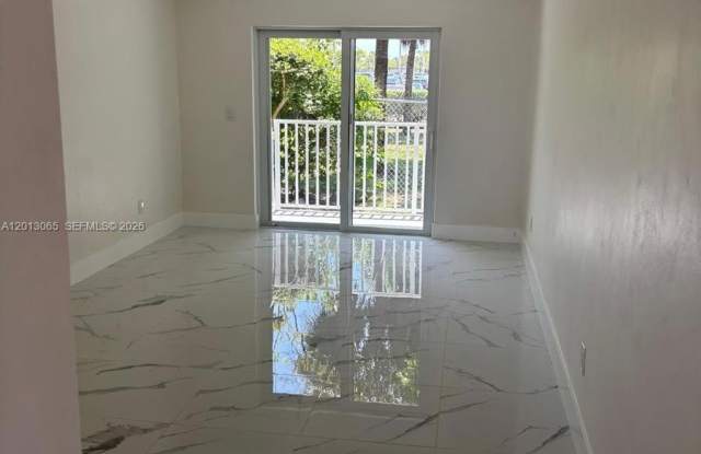 4298 NW South Tamiami Canal Dr photos photos