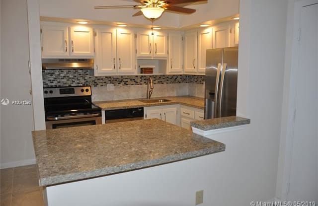 9767 W McNab Rd - 9767 West Mcnab Road, Tamarac, FL 33321