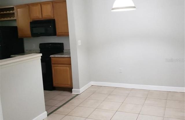 Well maintained condo in a GATED COMMUNITY with community POOL at heart of new Tampa Gallery 4