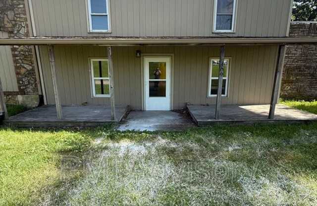 1409 NE Sardou Ave photos photos