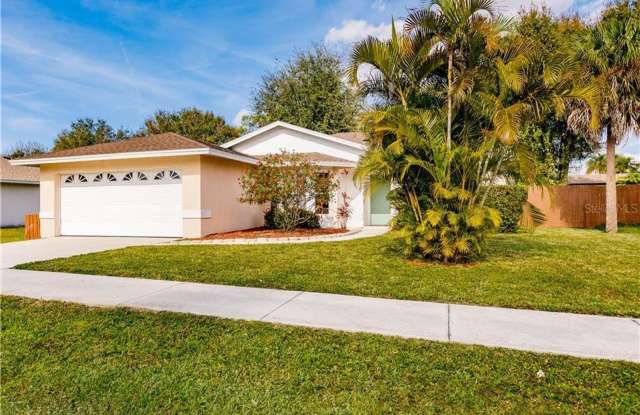3/2 HOME WITH HUGE /FENCED BACK YARD. -12 MINUTES to Siesta Beach! Great school district! photos photos