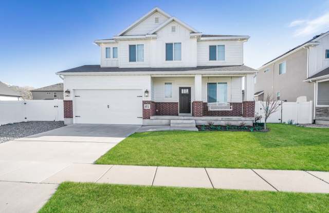 Spacious 4 Bed, 2.5 Bath Home with Central Air & 2-Car Garage! - Available NOW! photos photos