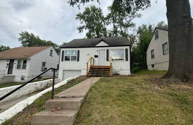 4 Bed 2 Bath Home with Garage Near Swope PKWY Available NOW! - 5433 Norton Avenue, Kansas City, MO 64130
