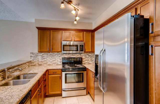 Updated two story townhome in sought-after NorthPark Gallery 3