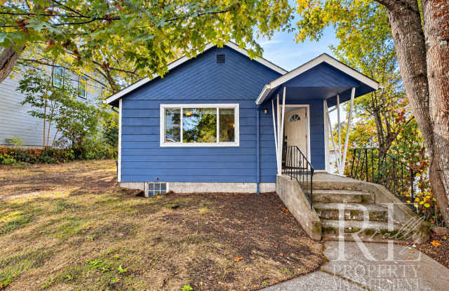 Charming 2-Bedroom Home with Original Hardwood Floors, Fenced Backyard & Abundant Storage Gallery 1