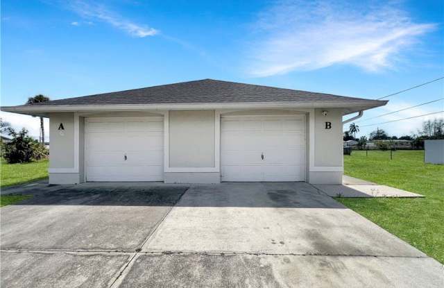 201 Schoolside Drive - 201 Schoolside Drive, Lehigh Acres, FL 33936
