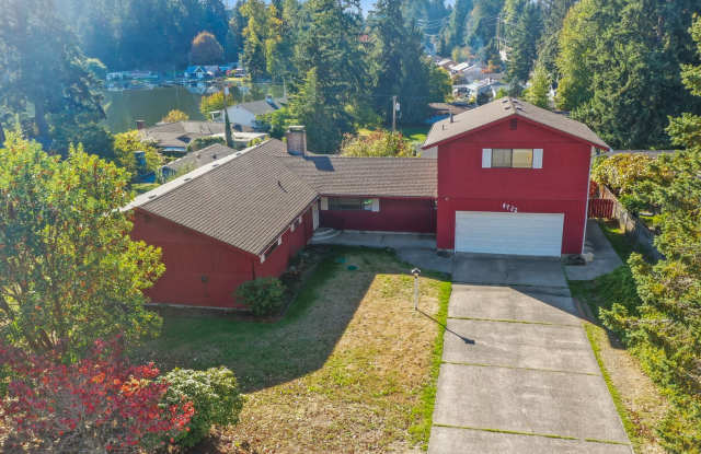 MOVE IN READY NOW! Peek a boo view of Pattison Lake - 3 bedrooms plus huge bonus room - bring your home business! Gallery 4