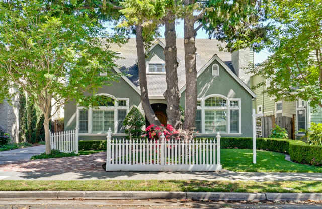 Stunning two-story spacious home on tranquil tree-lined street. photos photos