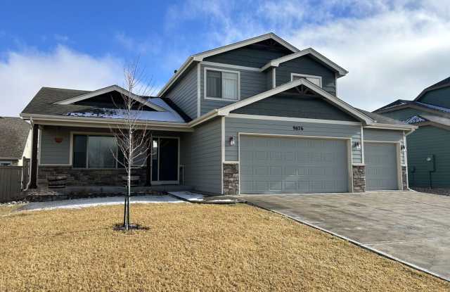 Spacious 5-Bedroom Home with Finished Basement and 3-Car Garage in Wellington photos photos