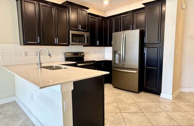 Waterfront Townhouse For Rent 3/2.5 In The Vistas at Champions Gate. Available now photos photos