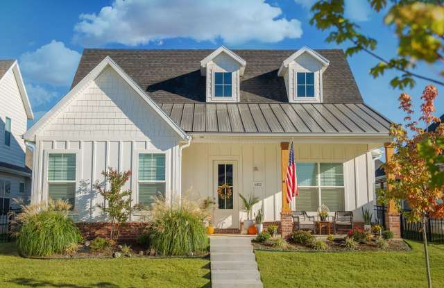 Beautiful newer cottage style home located in the middle of NWA. photos photos