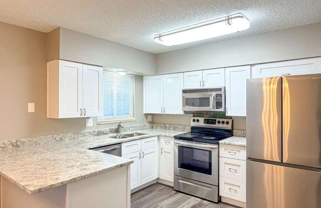 Updated Townhome with Covered Parking! photos photos