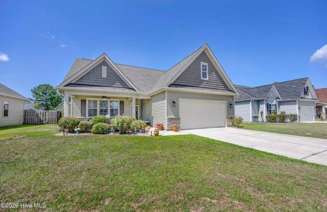 Discover this well-maintained 4-bedroom, 2-bath home in Leland, NC Gallery 1