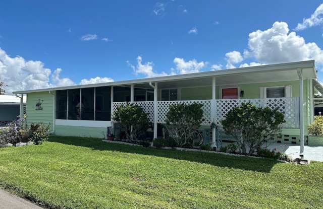 Updated Coastal 2BR/2BA Corner Lot Home in Gated 55+ Resort Gallery 3