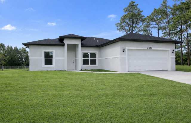 JUST BUILT! Spacious 4/2/2 Home -Perfect for Your Family in SW Lehigh Acres photos photos