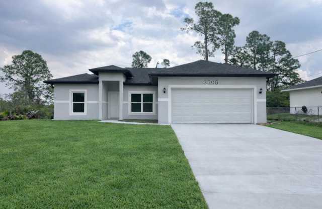 BRAND NEW CONSTRUCTION! GORGEOUS 4 BD/ 2BA HOME IN LEHIGH ACRES photos photos