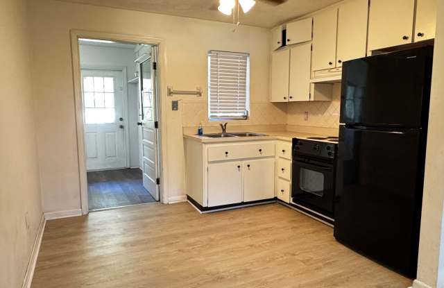 Charming 3-Bedroom Home with Beautiful Yard, Mature Trees & Modern Updates in Rainbow Lake Estates Gallery 4