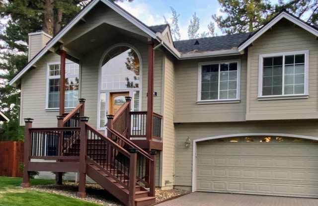 Large upscale home with large garage photos photos