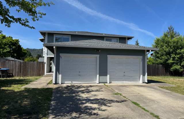Charming 3 bedroom 1.5 bathroom Two story Town House with an attached garage. photos photos