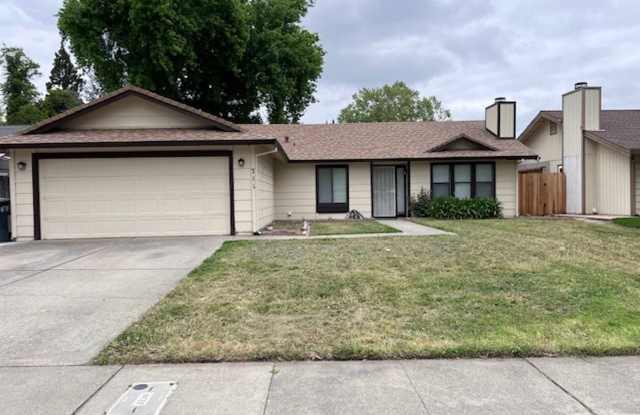 Pocket Area home with updated bathrooms and kitchen. Fresh paint, new carpet. - 711 Melanie Way, Sacramento, CA 95831