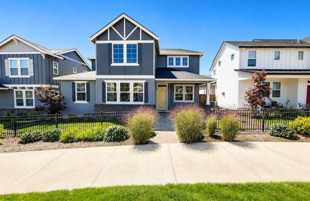 Stunning 2024 Home in Brynhill Community! Main-Level Primary Suite, Soaring Ceilings, Gourmet Kitchen, Office, Spacious Loft & Private Greenbelt Views! Gallery 1