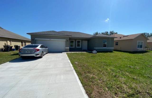 305 ERIE DRIVE - 305 Erie Drive, Poinciana, FL 34759