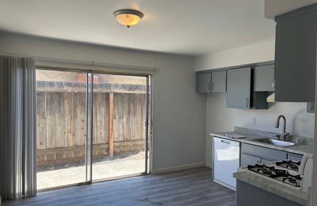 Ideal first floor unit! 2 bedrooms, 1 bathroom!  Directly across from beautiful Lake Alhambra. Private covered parking. Community laundry room.  SECTION 8 FRIENDLY! Gallery 3