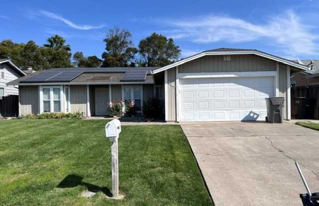 Laminate flooring throughout. Solar panels. Low maintenance yard. Gallery 1