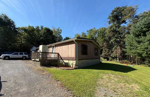 Set on over an acre in Saylorsburg, this 3-bedroom 2 bath Gallery 3