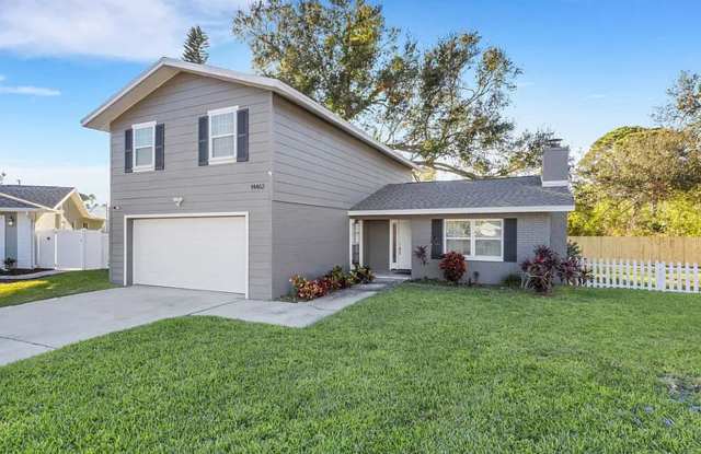 $1500 OFF SECOND MONTH'S RENT! Coastal Living Starts Here! Spacious 3BR Seminole Home with Bonus Room & Backyard Gallery 1