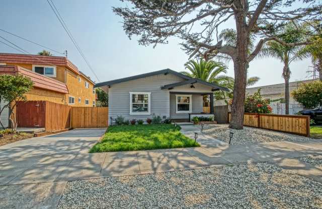 Remodeled, Bright & Charming Single-Story Home on Oversized Lot w/ Huge Back Yard, Front Yard w/ Porch Just 3 Blocks from Beach! photos photos