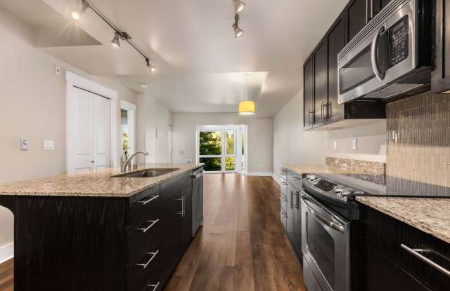 Modern 1-Bedroom + Den Condo with Parking, Storage & Rooftop Access – Marselle Condominiums photos photos