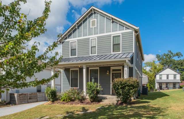 East Nashville cottage, large deck, pet friendly, large deck, open kitchen floor plan, available now! Gallery 4