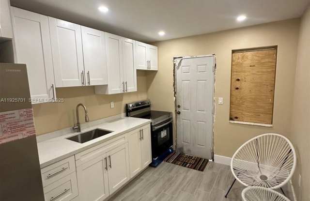 234 NE 55th Ter photos photos