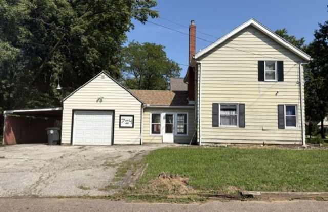 Updated 3BR Home with Open-Concept Kitchen, Bonus Lower-Level Bedroom & Garage Gallery 1
