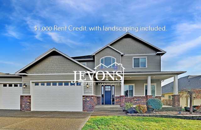 $1,000 Rent Credit - Spacious home with fully equipped kitchen, private backyard, 3-car garage, and landscaping included photos photos